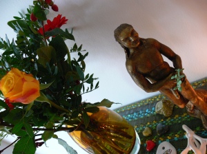 On my altar, next to the flowers I brought home for Him